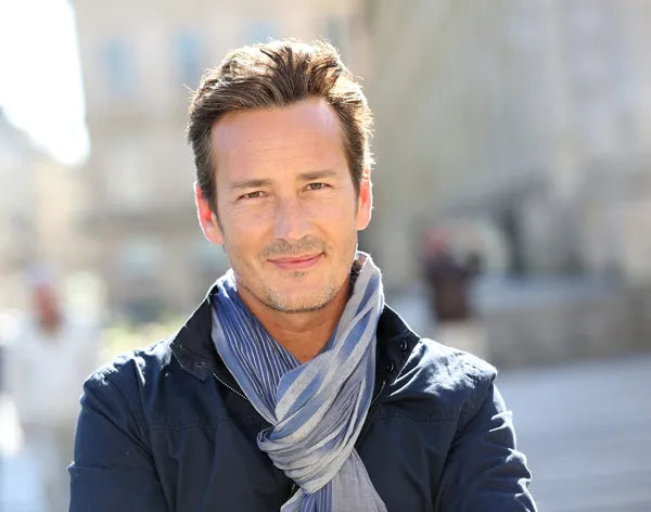 files/depositphotos_47780225-stock-photo-handsome-man-in-town.webp